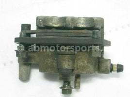Used Yamaha ATV YFZ 450 SE OEM part # 5TG-2580T-00-00 front left brake caliper for sale