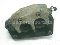 Used Yamaha ATV YFZ 450 SE OEM part # 5TG-2580T-00-00 front left brake caliper for sale