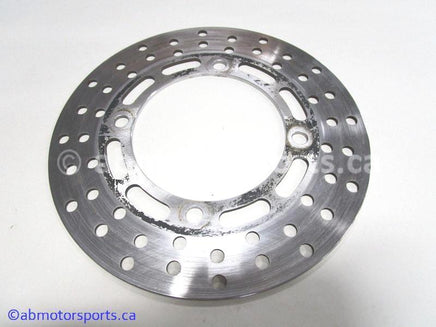 Used Yamaha ATV GRIZZLY 660 OEM part # 5KM-2582T-00-00 front brake disc for sale 