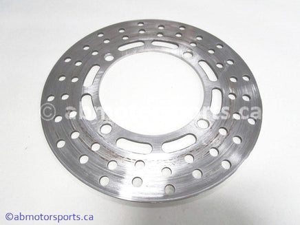 Used Yamaha ATV GRIZZLY 660 OEM part # 5KM-2582T-00-00 front brake disc for sale 