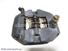 Used Yamaha ATV GRIZZLY 660 OEM part # 5KM-2580V-00-00 rear brake caliper for sale