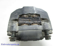 Used Yamaha ATV GRIZZLY 660 OEM part # 5KM-2580V-00-00 rear brake caliper for sale