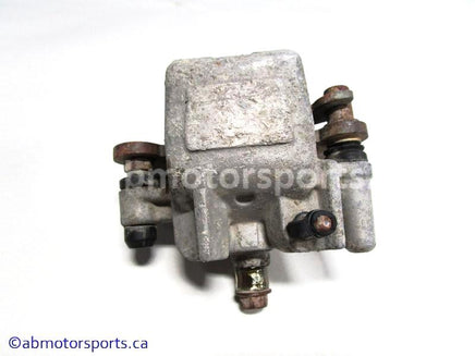 Used Yamaha ATV KODIAK 400 OEM part # 1P1-2580V-00-00 rear left brake caliper for sale