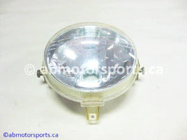 Used Yamaha ATV KODIAK 400 OEM part # 5KM-84320-01-00 head light lens for sale