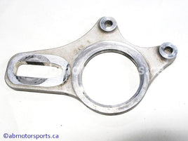 Used Yamaha ATV YFZ450 OEM part # 5TG-25721-20-00 caliper bracket for sale