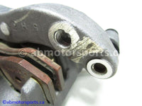 Used Yamaha ATV YFZ450 OEM part # 5TG-2580W-20-00 rear brake caliper for sale