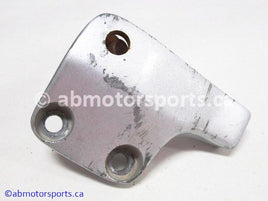 Used Yamaha ATV YFZ450 OEM part # 5TG-25727-00-00 park brake bracket for sale
