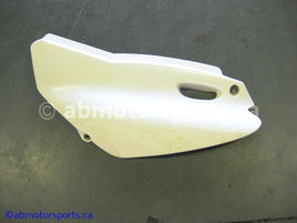 Used Yamaha Dirt Bike TTR 125 OEM part # 5HP-21711-00-00 left side cover for sale