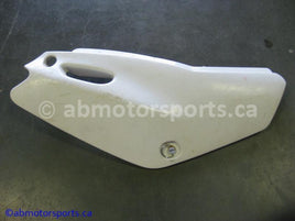Used Yamaha Dirt Bike TTR 125 OEM part # 5HP-21721-00-00 right side cover for sale