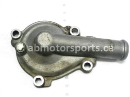 Used Yamaha Dirt Bike YZ250F OEM part # 5NL-12422-10-00 OR 5NL-12422-00-00 water pump housing cover for sale