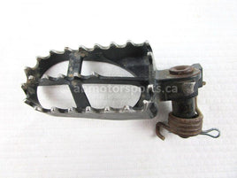 A used Foot Peg L from a 2006 WR250F Yamaha OEM Part # 5ET-27411-00-00 for sale. Yamaha dirt bike parts… Shop our online catalog… Alberta Canada!