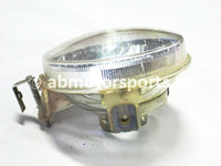Used Yamaha UTV RHINO 700 FI OEM part # 4320-01-00 OR 5KM-84320-00-00 headlight lens for sale